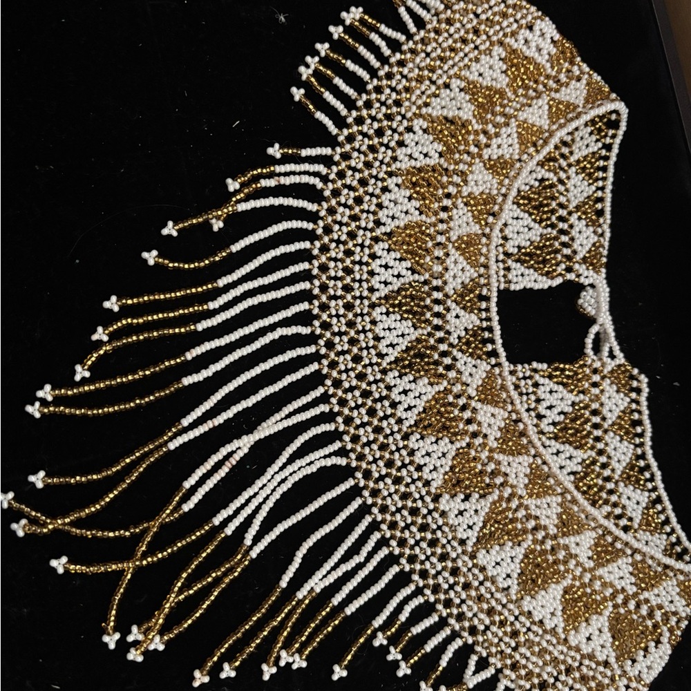Elegant Gold and White Beaded Necklace